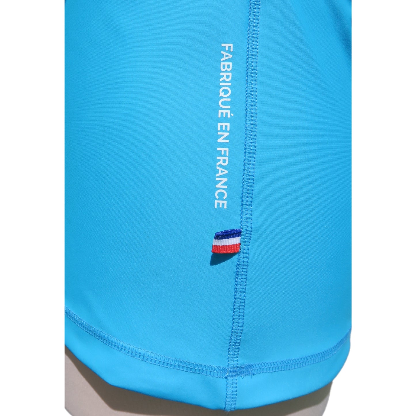 Lycra_homme_MC_bleu_ciel_made_in_France_UPF50_goutte_F2M top tee-shirt anti uv manches courtes rashguard ruban tricolore fabriqué en france