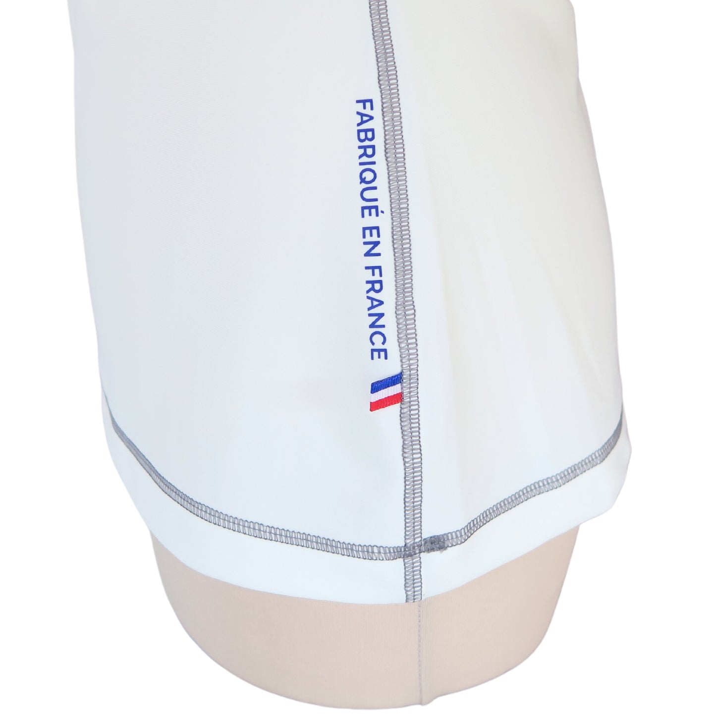 ashguard lycra anti uv femme manches courtes blanc fabriqué en France UPF50+ Made in France avec des filets de pêche recyclés, écolo, durable, top maillot tee-shirt eco responsable F2M ruban tricolore